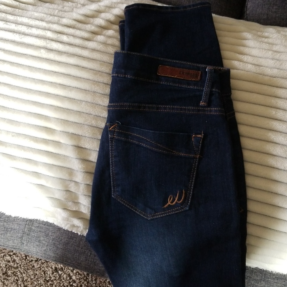 Express dark wash skinny jeans
